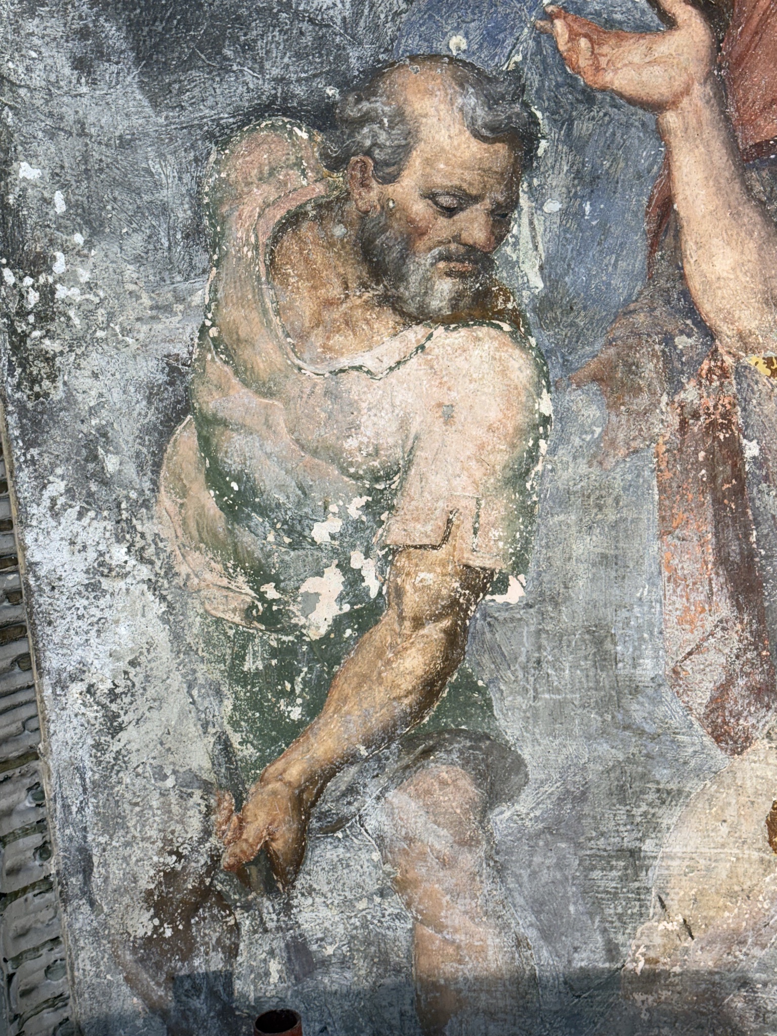 Particolare in alta risoluzione del carnefice barbuto durante il restauro, affresco di Pellegrino Tibaldi a Claino - derivazione michelangiolesca della Crocefissione di San Pietro