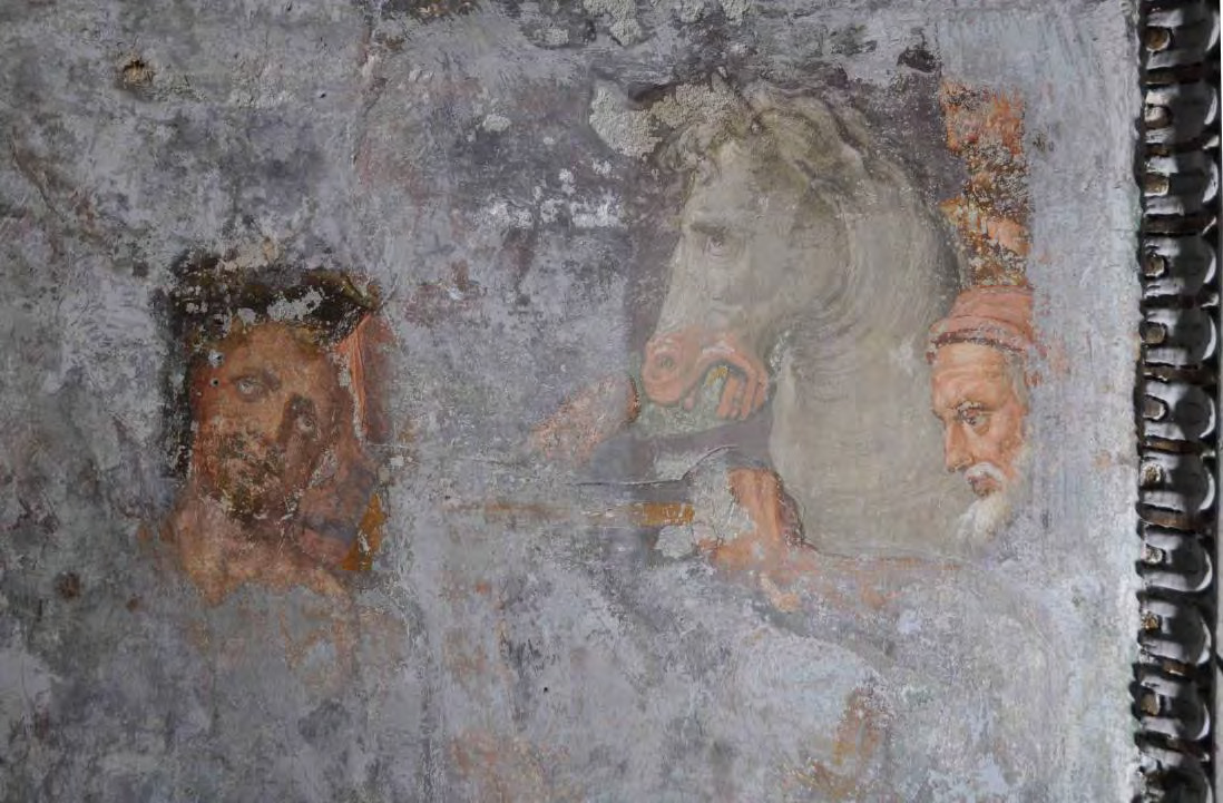 Saggio di pulitura sul riquadro sinistro: il cavallo di Daciano e i carnefici emergono dalla nebbia di scialbo, restauro Tovagliaro